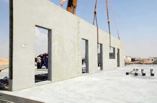 Prefabricated Cellate structural panels being erected